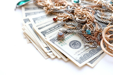 Many expensive golden and silver jewerly rings, earrings and necklaces with big amount of US dollar...