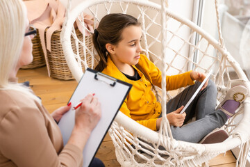 Cute little girl at child psychologist's office.