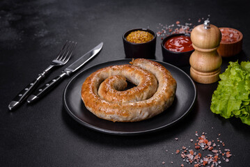 Baked homemade sausage with spices and herbs, close up