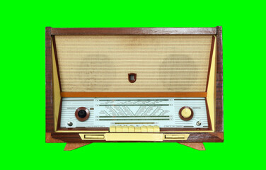 Vintage Radiola (radio) isolated on green background. Latvian Soviet Vintage Radiola (radio)...