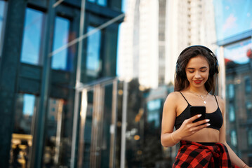 Young pretty girl with scar walking in the city