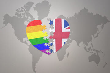 puzzle heart with the rainbow gay flag and great britain on a world map background. Concept.
