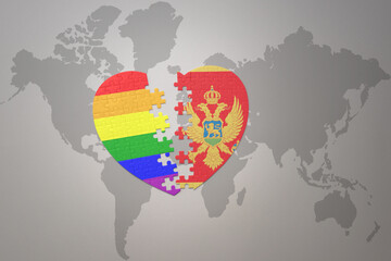 puzzle heart with the rainbow gay flag and montenegro on a world map background. Concept.