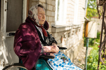 very old senior woman in wheelchair