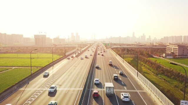 aerial view of traffic on elevated expressway in hangzhou qianjiang centry city at sunset
