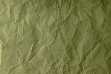 crumpled paper. sheet of green paper. detailed high resolution texture. abstract background for wallpaper.