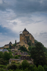 vertical view of the castle in Castelnaud-la-Chapelle in the Dordogne Valley under an overcast sky