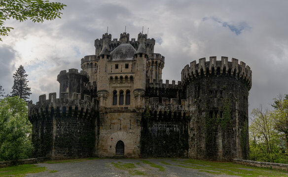 view of the picturesque Butron Castle near Gatika in the Spanish Basque Country under an overcast sky