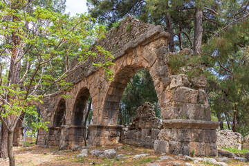 Fototapeta na wymiar The Phaselis Aqueduct at the ancient city on the coast of Antalya Province in Turkey.