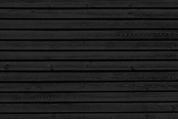 Black wooden board wall texture. Old knotty wood planks dark wallpaper. Abstract grunge background