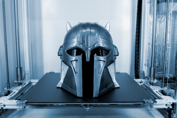 Object printed on 3D printer, on desktop of 3d printer. Progressive modern additive technology. Concept of 4.0 industrial revolution. Modern 3D printing additive technology.