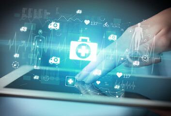 Close-up of a touchscreen with healthcare icons