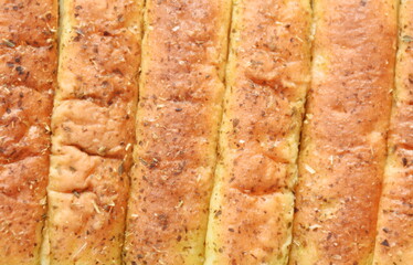 crispy baking bread stick dressing dry mashed oregano on plate dipping cocktails sauce