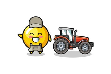 the egg yolk farmer mascot standing beside a tractor