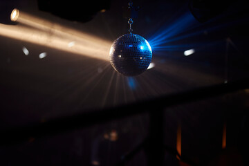 disco ball. disco ball background close up. Party disco mirror ball reflecting blue color lights 