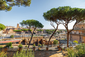 Scenic view on the ancient Roman city from Capitolium hill. Rome cityscape on a sunny day. Concept of historical italian landmarks and travel Italy