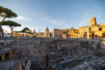 Scenic view on ruins of Roman Forum at sunset. Concept of historical landmarks and travel Italy