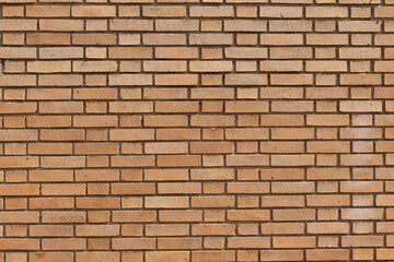 Orange brick masonry wall, bright orange brick background