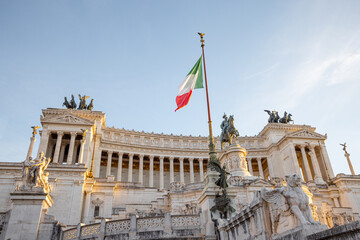 View on Monument of Vittorio Emanuele from square Venezia in Rome. Sunset cityscape with Roman landmarks. Concept of historical landmarks and travel Italy
