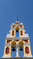 Church steeple and bells against blue sky in Greece, Cyclades islands