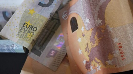 Image of the bridge on a 50 euro banknote, macro video. European paper money. 4k video