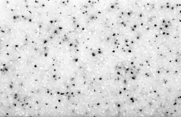 Background Stone wall, white background with abstract gray stains of epoxy. Beautiful marble and granite texture, onyx surface. Finishing stone for the interior. Acrylic stains.