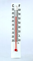 A weather thermometer is isolated on a white background.
