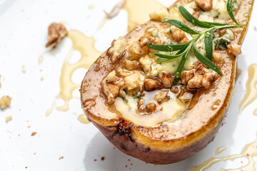 Pears baked with blue cheese, nuts and honey. French cuisine. Keto diet. Vegetarian lunch. banner, menu, recipe place for text, top view