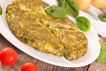 Spanish omelette with spinach.