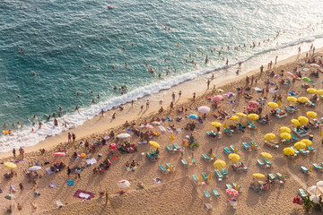Sandy beach of Cleopatra in Turkey from a bird's eye view. Beach and sea from above. Travel to Turkey.
