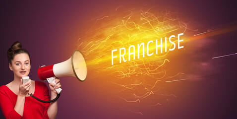 Young girld shouting in megaphone