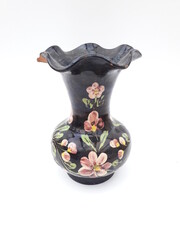 Folk art ceramic vase with colorful flowers