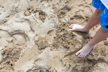 feet on the sand
