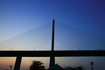 Cable-stayed bridge at sunset time in Bangkok