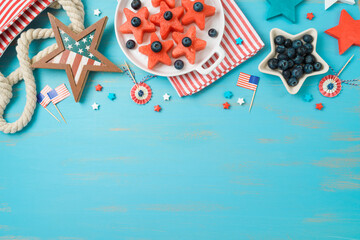 Happy Independence Day, 4th of July festive table setting with summer fruit salad and decorations...