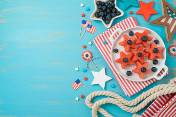 4th of July background with summer fruit salad on wooden background. Happy Independence Day picnic concept. Top view, flat lay
