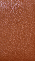 Texture of rich brown colored cow leather for abstract background