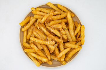 Parmesan Truffle Fries on a Plate with a White Background