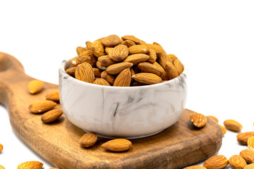 Almond nuts isolated on a white background. Organic nuts. close up