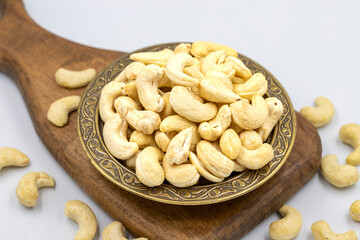 Cashew nuts isolated on white background. Organic nuts. close up