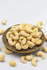 Cashew nuts isolated on white background. Organic nuts. close up