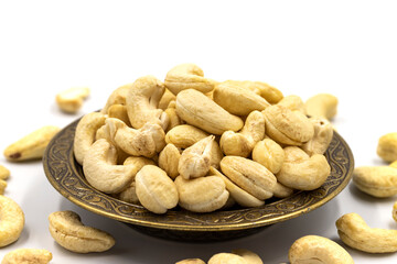 Cashew nuts isolated on white background. Organic nuts. close up