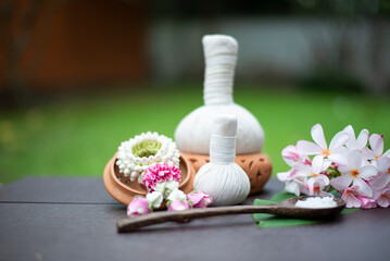 Obraz na płótnie Canvas Thai spa massage Spa treatment cosmetic beauty. for relax wellness Aroma and salt scrub setting ready healthy lifestyle