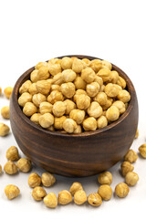 Roasted hazelnut nut isolated on white background. Organic nuts. close up