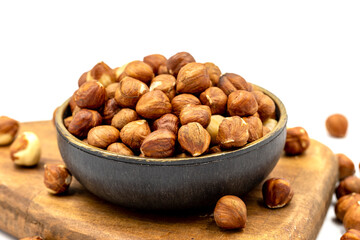 Hazelnut nuts isolated on white background. Organic nuts. close up