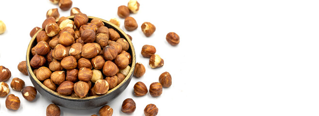 Hazelnut nuts isolated on white background. Organic nuts. Copy space. Space for text. close up