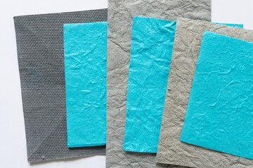 gray and blue paper shapes