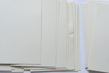 old, blank, watercolor paper post-cards viewed from above