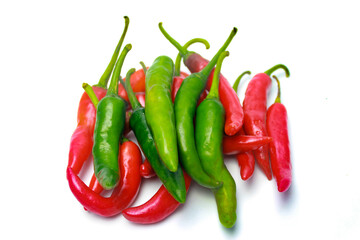 Green and Red Cayenne Pepper Isolated on a White Background