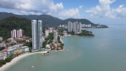 Fototapeta premium Georgetown, Penang Malaysia - May 20, 2022: The Straits Quay, Landmark Buildings and Villages Along its Surrounding Beaches